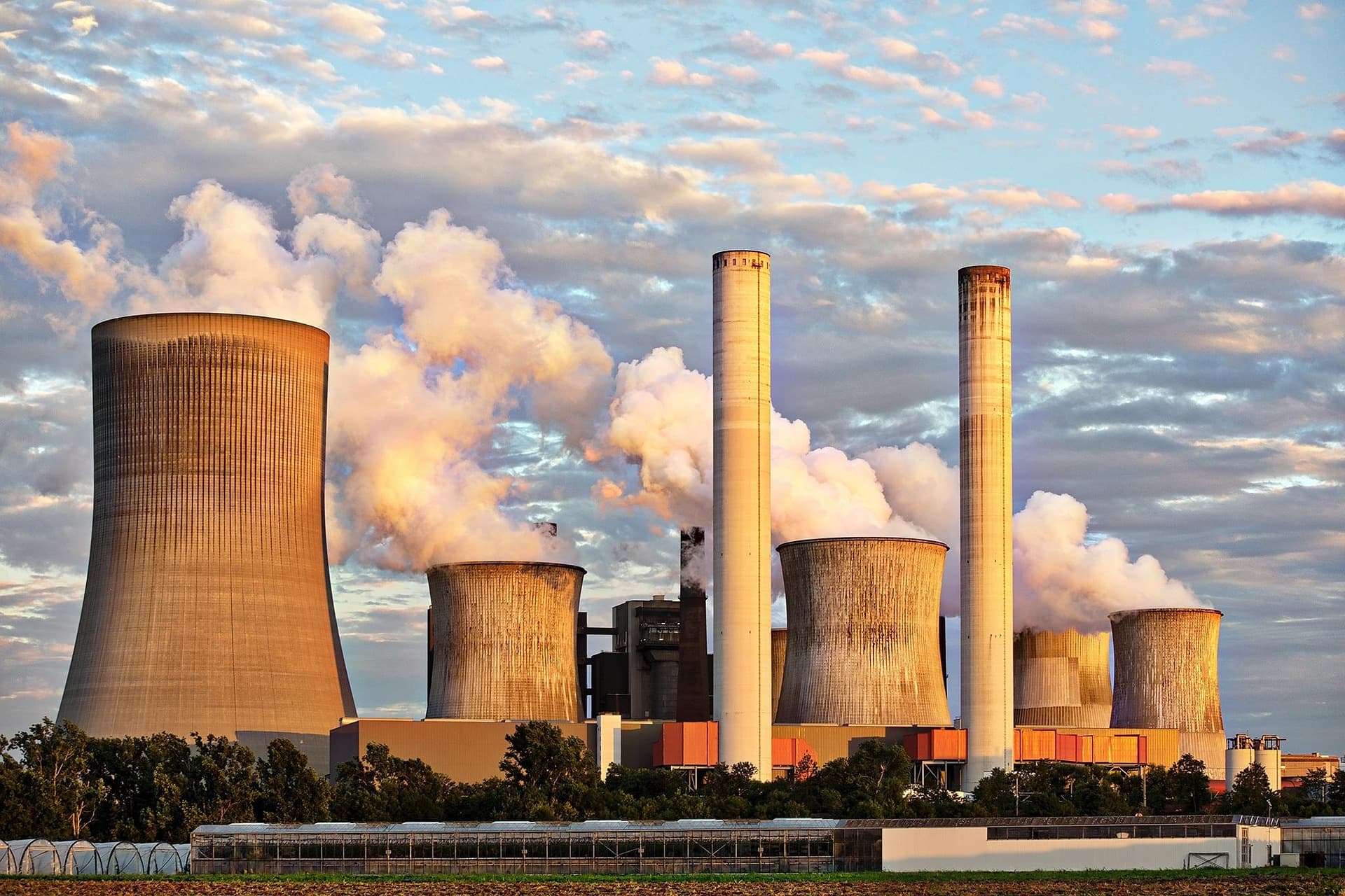 Modern energy infrastructure facility at night.